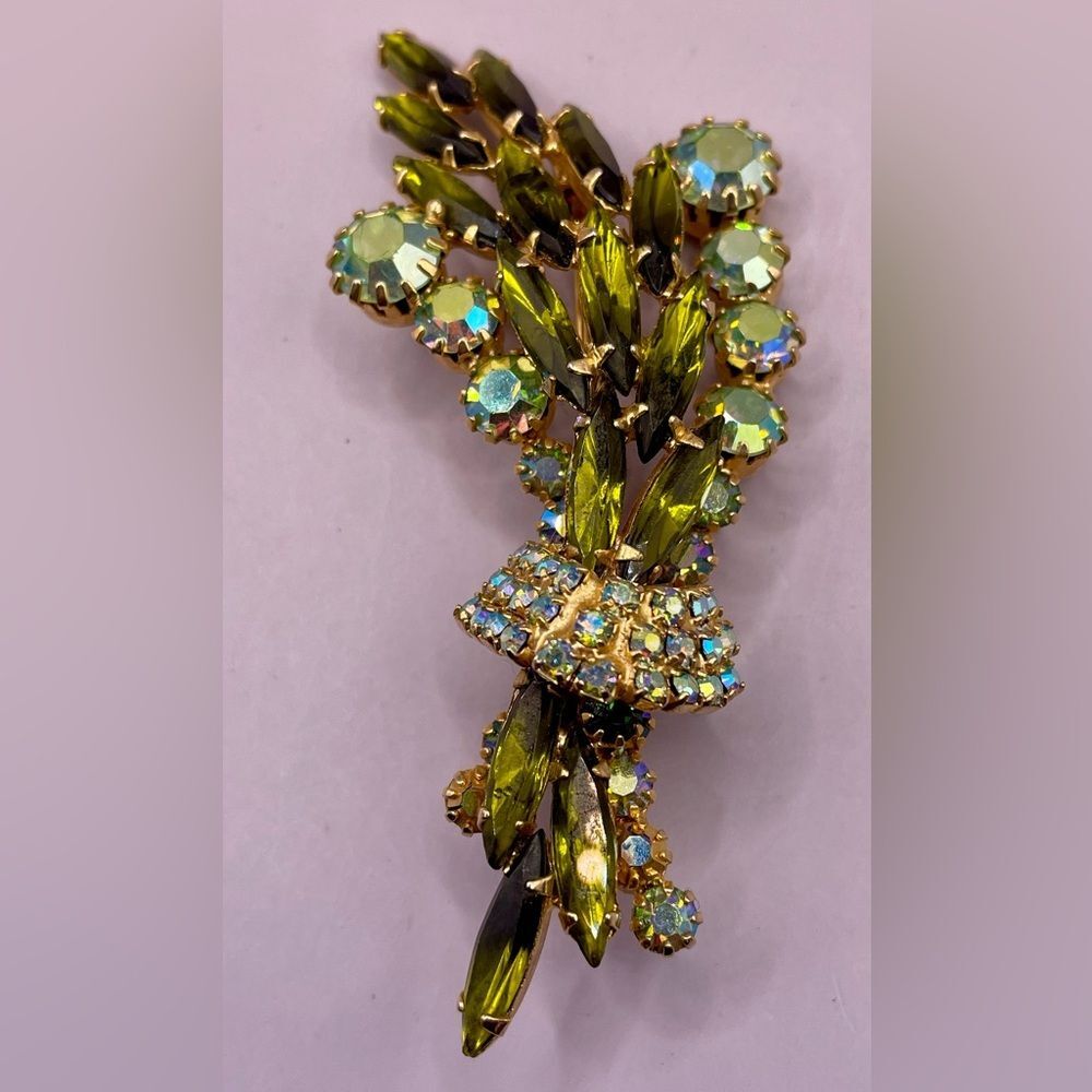 Vintage green gems and clear rhinestone leaf brooch. Gold tone. Chunky. Glam